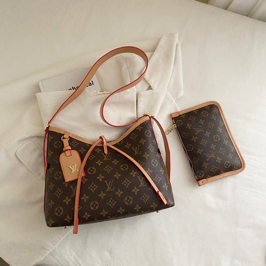 Bolso de hombro con monograma y correa cruzada